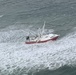 The Coast Guard hoisted four fishermen from an 88-foot fishing vessel in Browns Inlet, North Carolina.