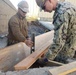 U.S. Navy Seabees deployed with Naval Mobile Construction Battalion 5’s Detail Sasebo work on the seawall repair project on board Commander Fleet Activities Sasebo