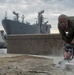 U.S. Navy Seabees deployed with Naval Mobile Construction Battalion 5’s Detail Sasebo work on the seawall repair project on board Commander Fleet Activities Sasebo