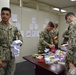 U.S. Navy Seabees deployed with NMCB-5’s Detail Iwakuni receive care packages