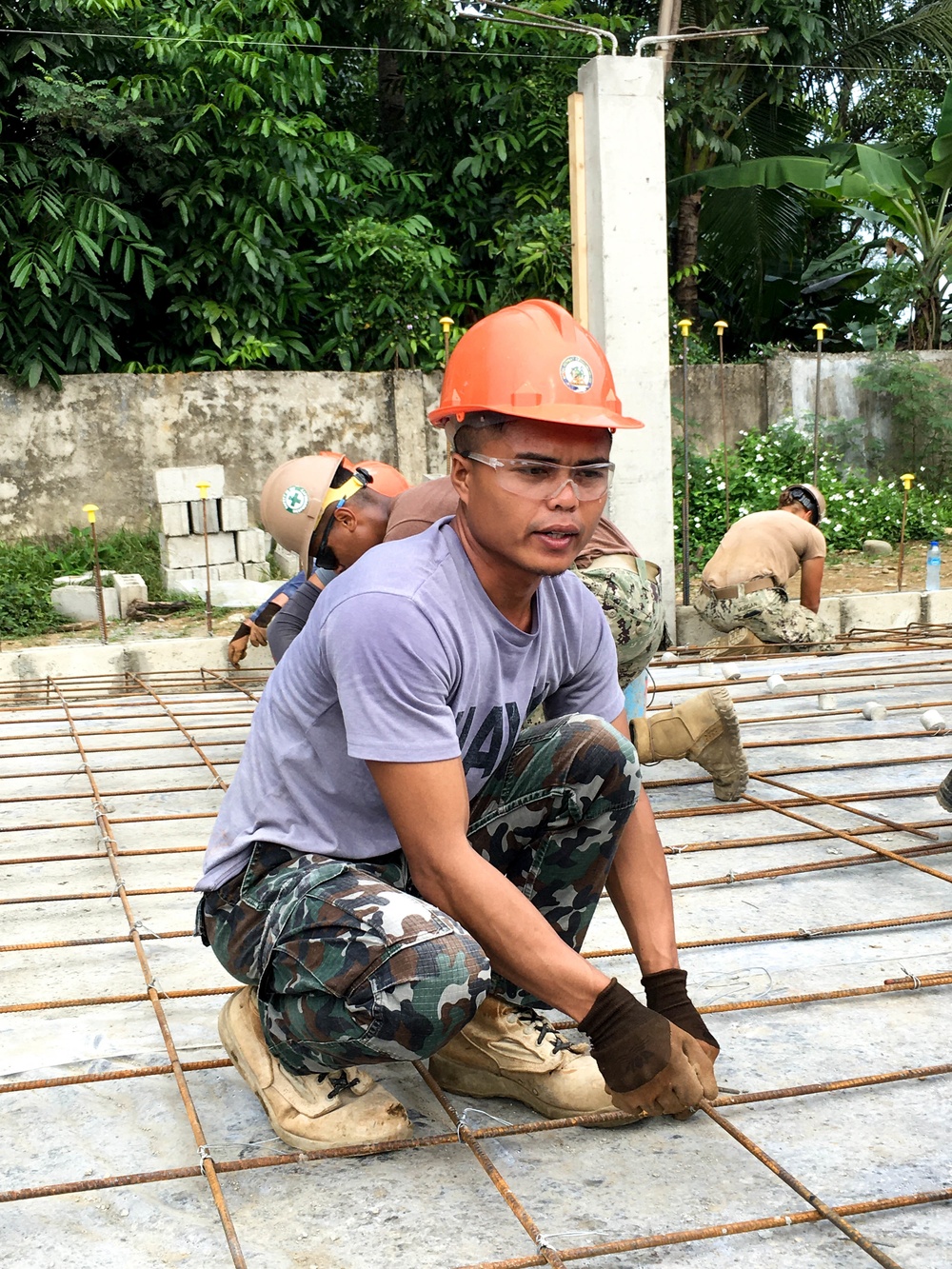 U.S. Navy Seabees deployed with NMCB-5’s Detail Palawan continue construction on Malatgao Elementary School