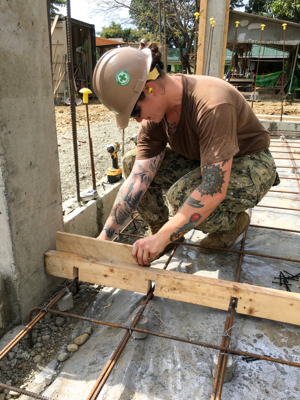 U.S. Navy Seabees deployed with NMCB-5’s Detail Palawan continue construction on Malatgao Elementary School