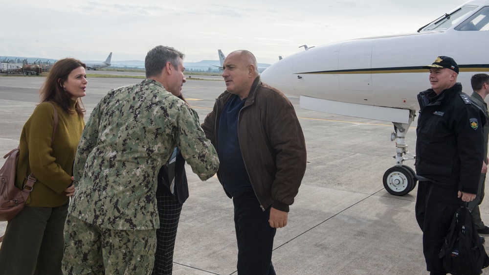 Capt. Pickard, NAS Sigonella command officer, greets greets Boyko Borissov, prime minister of Bulgaria, onboard NAS Sigonella.