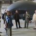 Lt. Col. Douglas Pruitt, executive officer, 7th Reconnaissance Squadron, talks with a delegation from  Bulgaria onboard Naval Air Station (NAS) Sigonella.