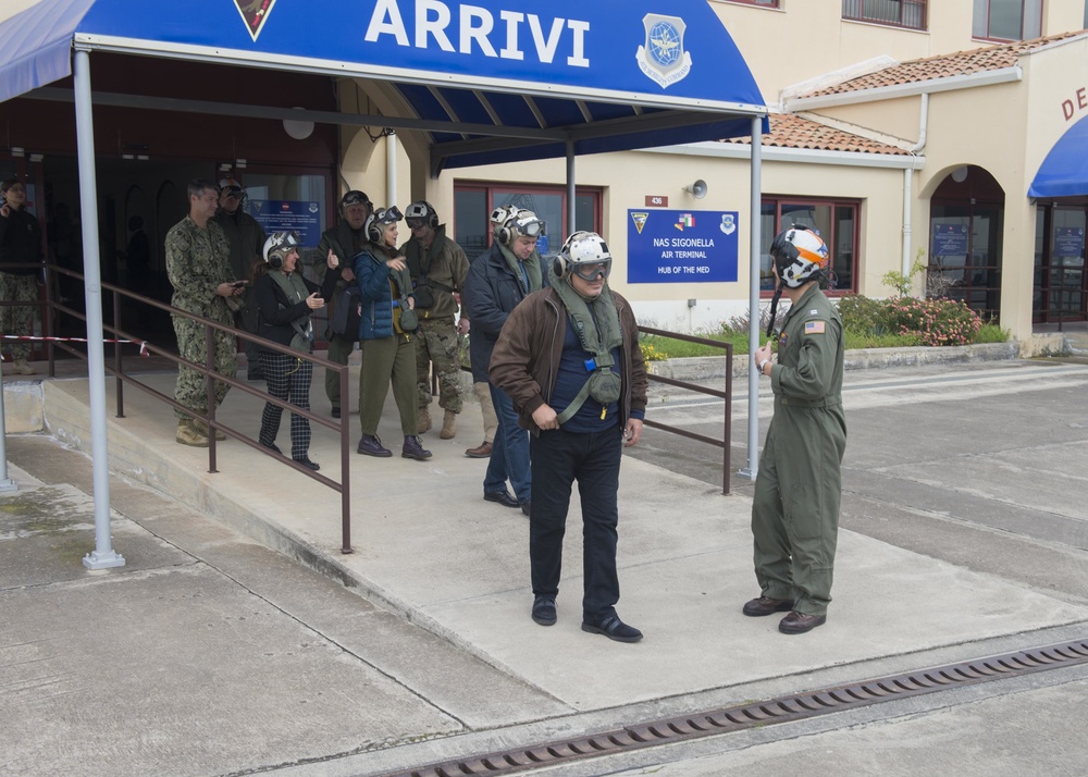 Bulgarian Prime Minister Boyko Borissov prepares to board a C-2A Greyhound onboard NAS Sigonella