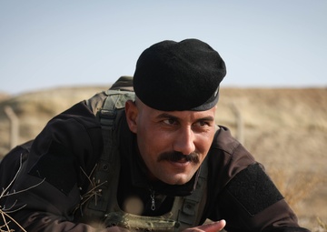 Iraqi Police Conduct Tactical Maneuver Training