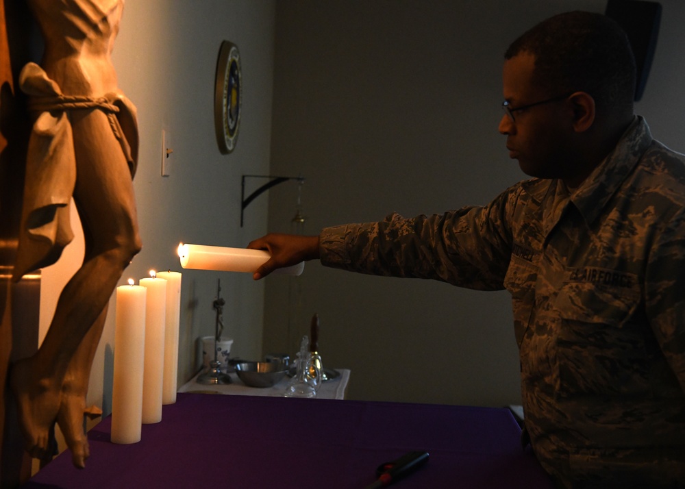 Airmen from the 104th Fighter Wing attend Candlelight service