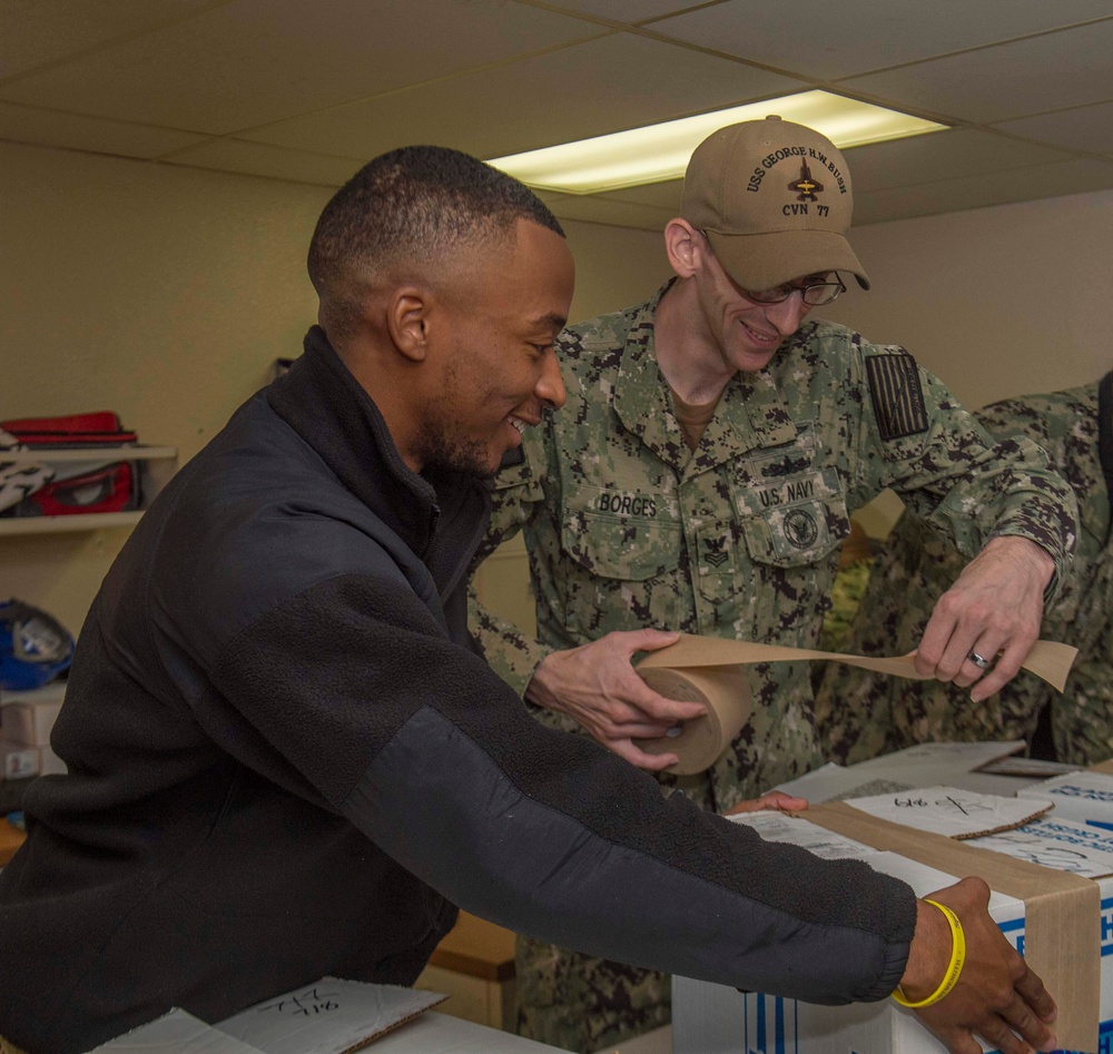 GHWB Sailors Assemble Care Packages