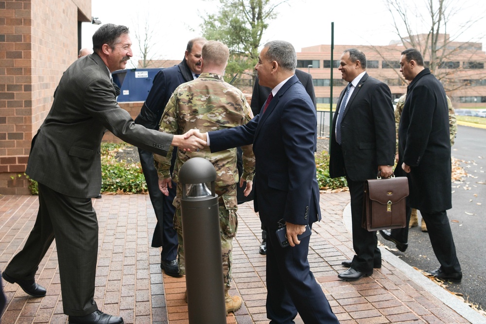 Deputy Director of Operations &amp; Integration, SES Mr. Kyle Lampela greets a member of the Egyptian Armed Forces