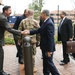 Deputy Director of Operations &amp; Integration, SES Mr. Kyle Lampela greets a member of the Egyptian Armed Forces