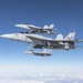 Three F/A-18E aircraft from Strike Fighter Squadron (VFA) 136 &quot;Knighthawks&quot; fly in formation over the Sea Test Range