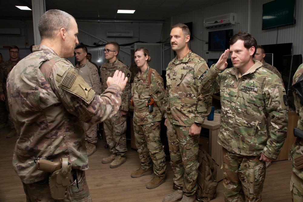 Lt. Gen. White Visits Service Members and Awards Coins