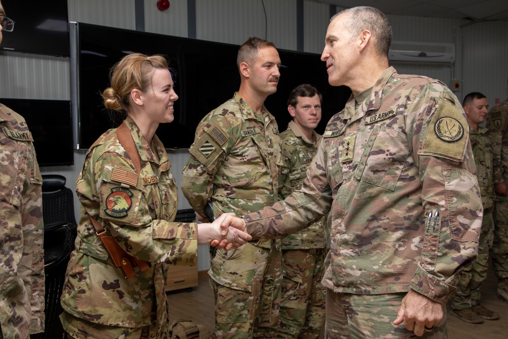 Lt. Gen. White Visits Service Members and Awards Coins