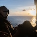 U.S. Air Crewman monitors flight activity