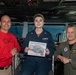 U.S. Sailors pose for a photo