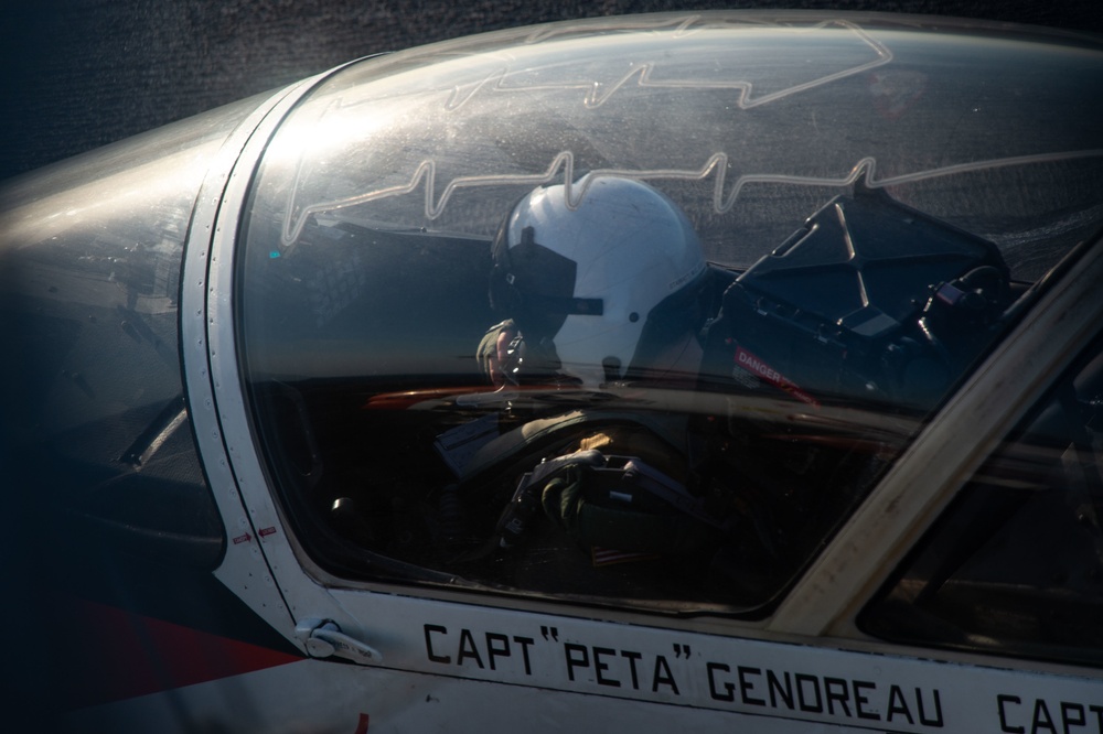 U.S. Sailor prepares to take off