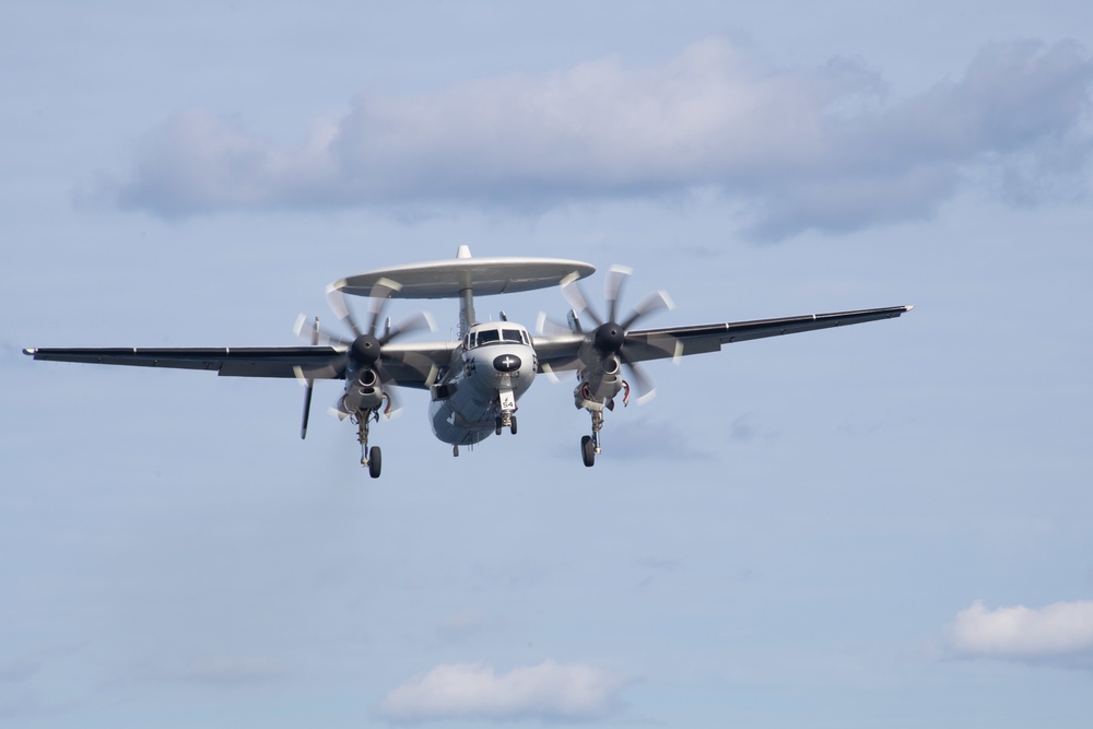 E-2C Hawkeye, assigned to Airborne Early Warning Squadron (VAW) 120, appraches the flight deck