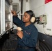 Sailor operates weapons elevator