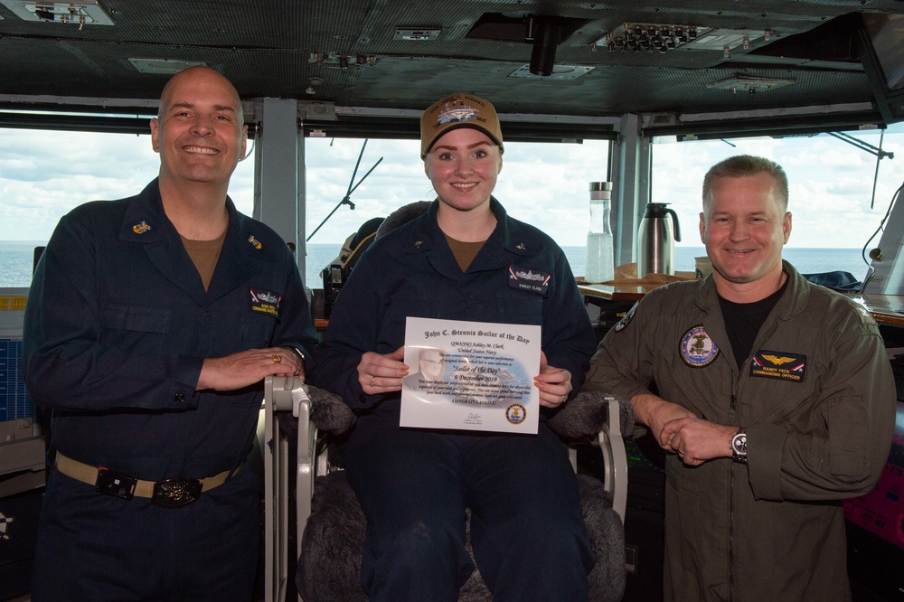 U.S. Sailors pose for photo