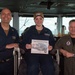 U.S. Sailors pose for photo