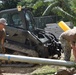 U.S. Navy Seabees deployed with NMCB-5’s Detail Tinian continue work on Explosive Ordnance Disposal Mobile Unit 5’s Boat Storage Facility