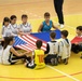 MKAB service members compete in a charity basketball game in Romania