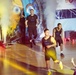 MKAB service members compete in a charity basketball game in Romania