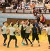 MKAB service members compete in a charity basketball game in Romania
