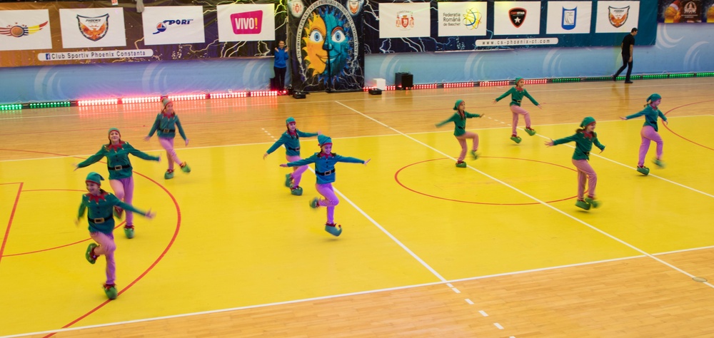 MKAB service members compete in a charity basketball game in Romania