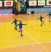 MKAB service members compete in a charity basketball game in Romania
