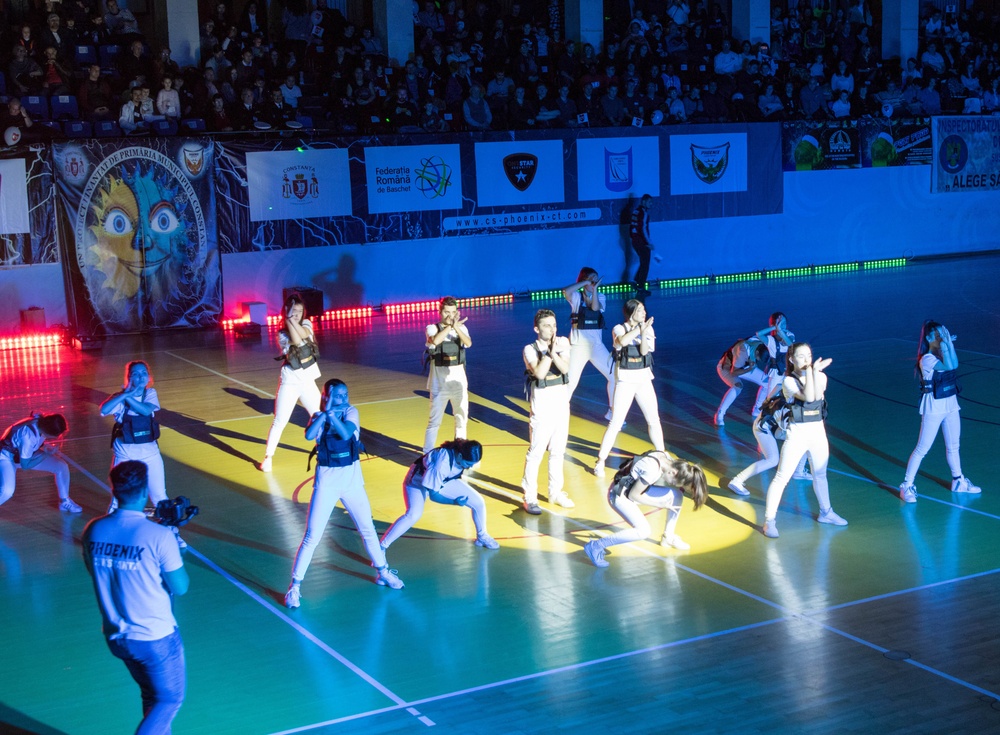 MKAB service members compete in a charity basketball game in Romania