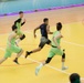 MKAB service members compete in a charity basketball game in Romania