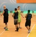 MKAB service members compete in a charity basketball game in Romania
