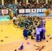 MKAB service members compete in a charity basketball game in Romania