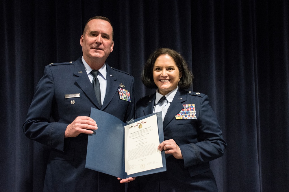 Lt. Col. Shelly Assiff receives the  Meritorious Service Medal fourth oak leaf cluster