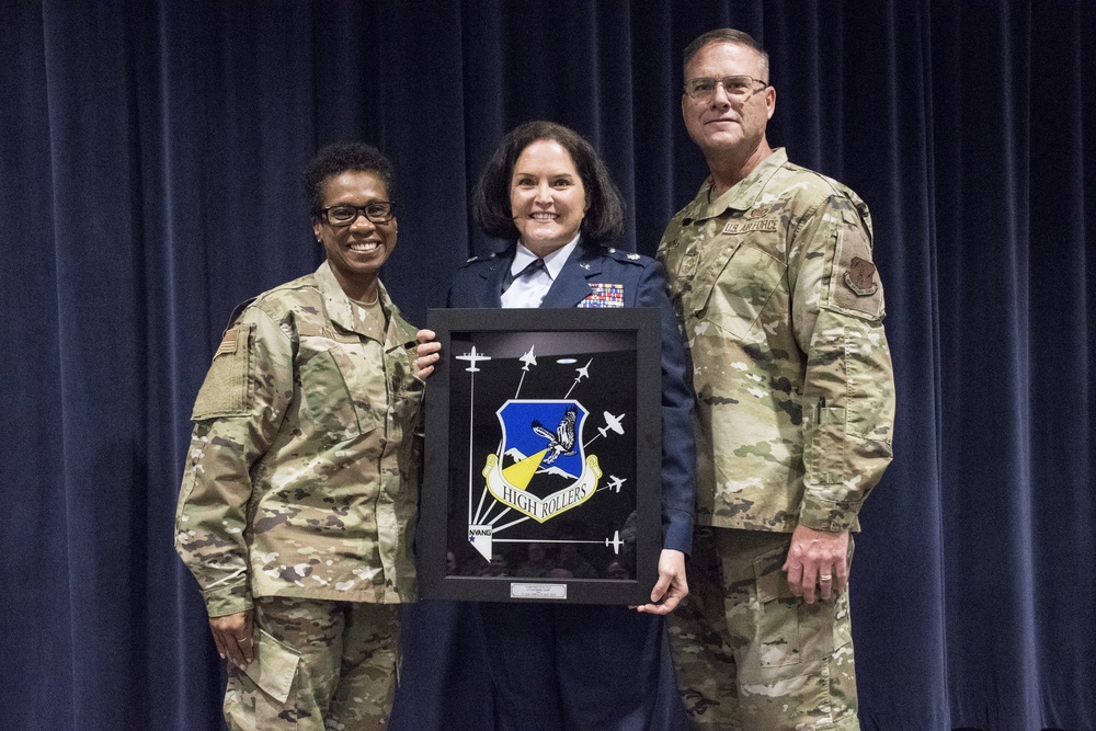 Lt. Col. Shelly Assiff receives the High Roller Mirror for over 20 years service with the Nevada Air National Guard