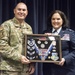 Lt. Col. Shelly Assiff receives her shadow box at her retirement ceremony