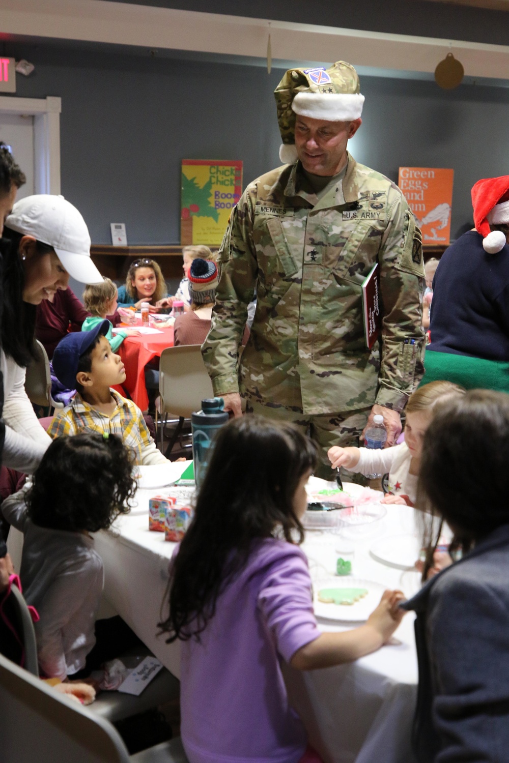 CG reads to children through the USO