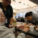 Sailors Make Gingerbread Houses with Veterans at the Washington Veterans Home