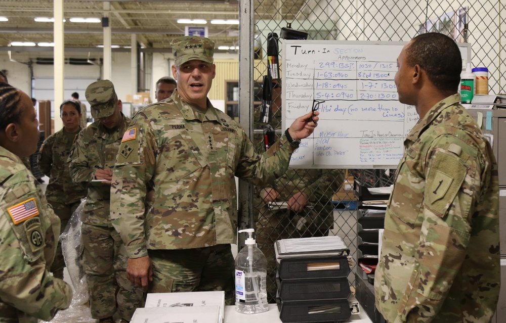 Gen. Gustave F. Perna, Commanding General, US Army Material Command, discusses timeliness of parts and services actions with Soldiers