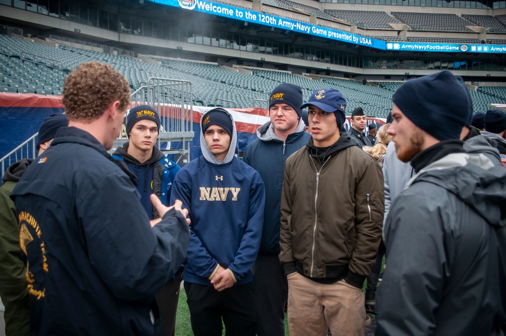 Members of CNRC, NRD Philadelphia recruiters and future Sailors conduct walkthrough at the stadium prior to the Army-Navy game