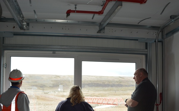 Project manager, Stella Marco reviewing construction work