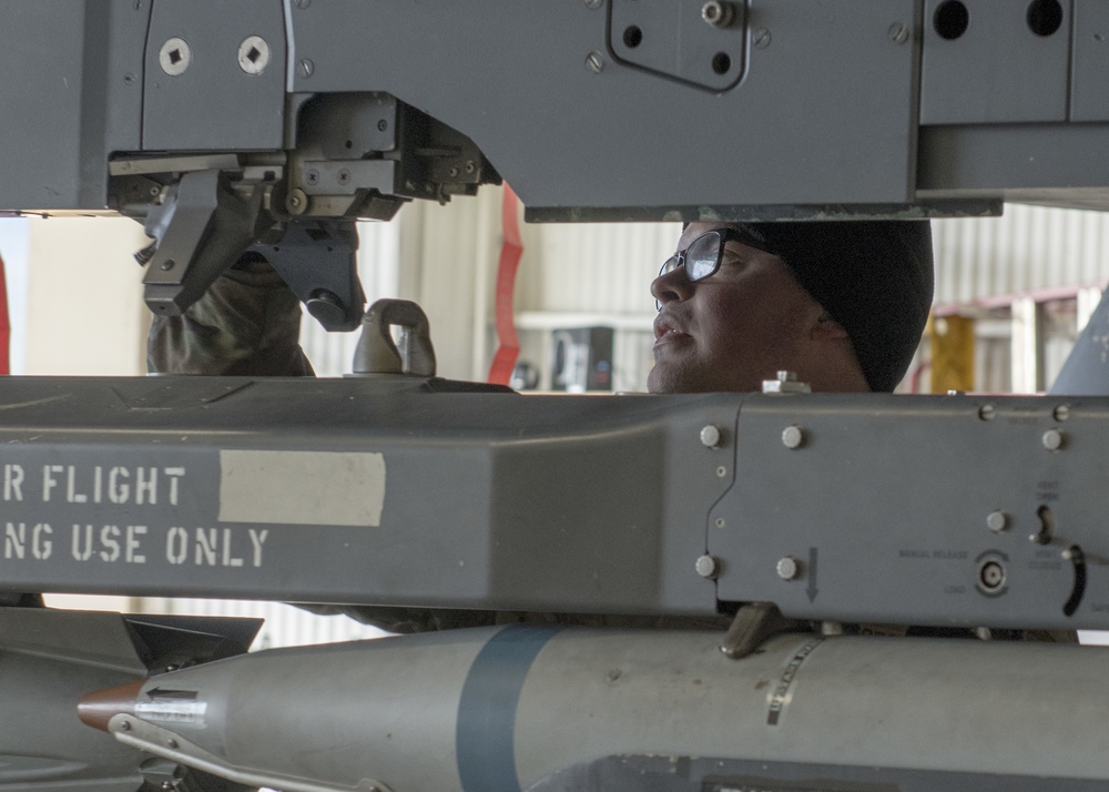 Weapons load crew members train to earn initial certification