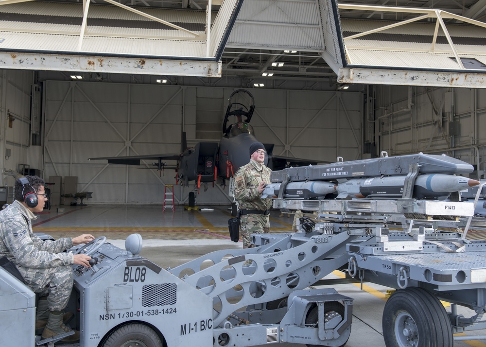 Weapons load crew members train to earn initial certification