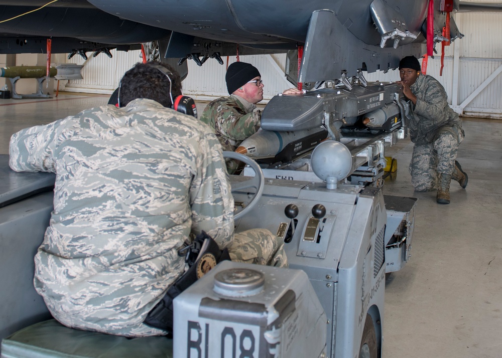 Weapons load crew members train to earn initial certification