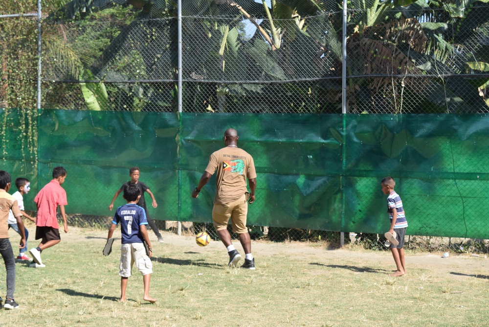 U.S. Navy Seabees deployed with NMCB-5’s Detail Timor-Leste volunteer at a local orphanage