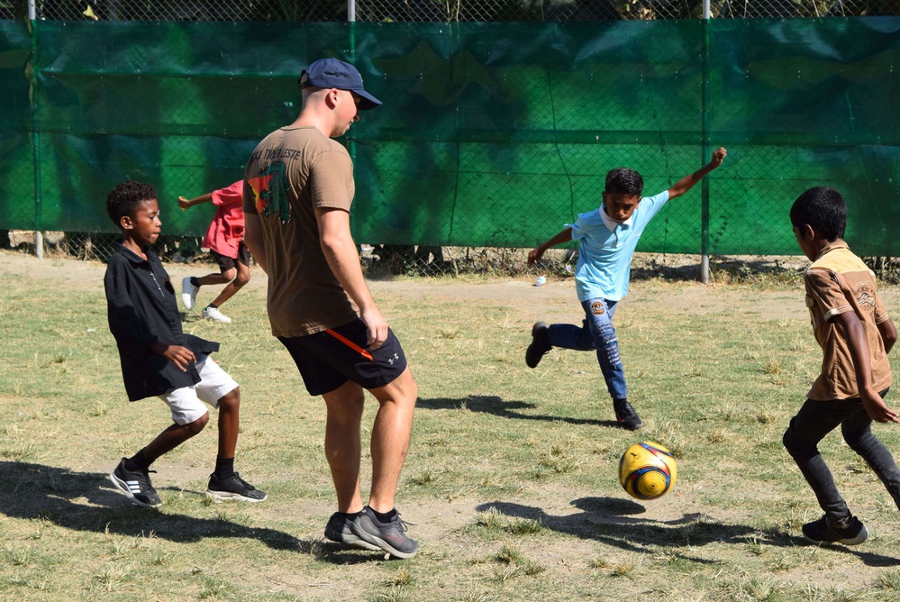 U.S. Navy Seabees deployed with NMCB-5’s Detail Timor-Leste volunteer at a local orphanage