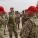 U.S. Army Gen. Steve Lyons puts on Red Horse hat