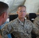 U.S. Marine Corps Lt. Gen. Carl E. Mundy III listens to a briefing on PSAB