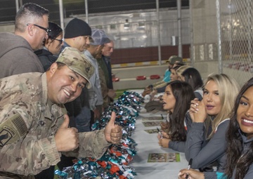 Miami Dolphins spread holiday cheer to troops in Jordan